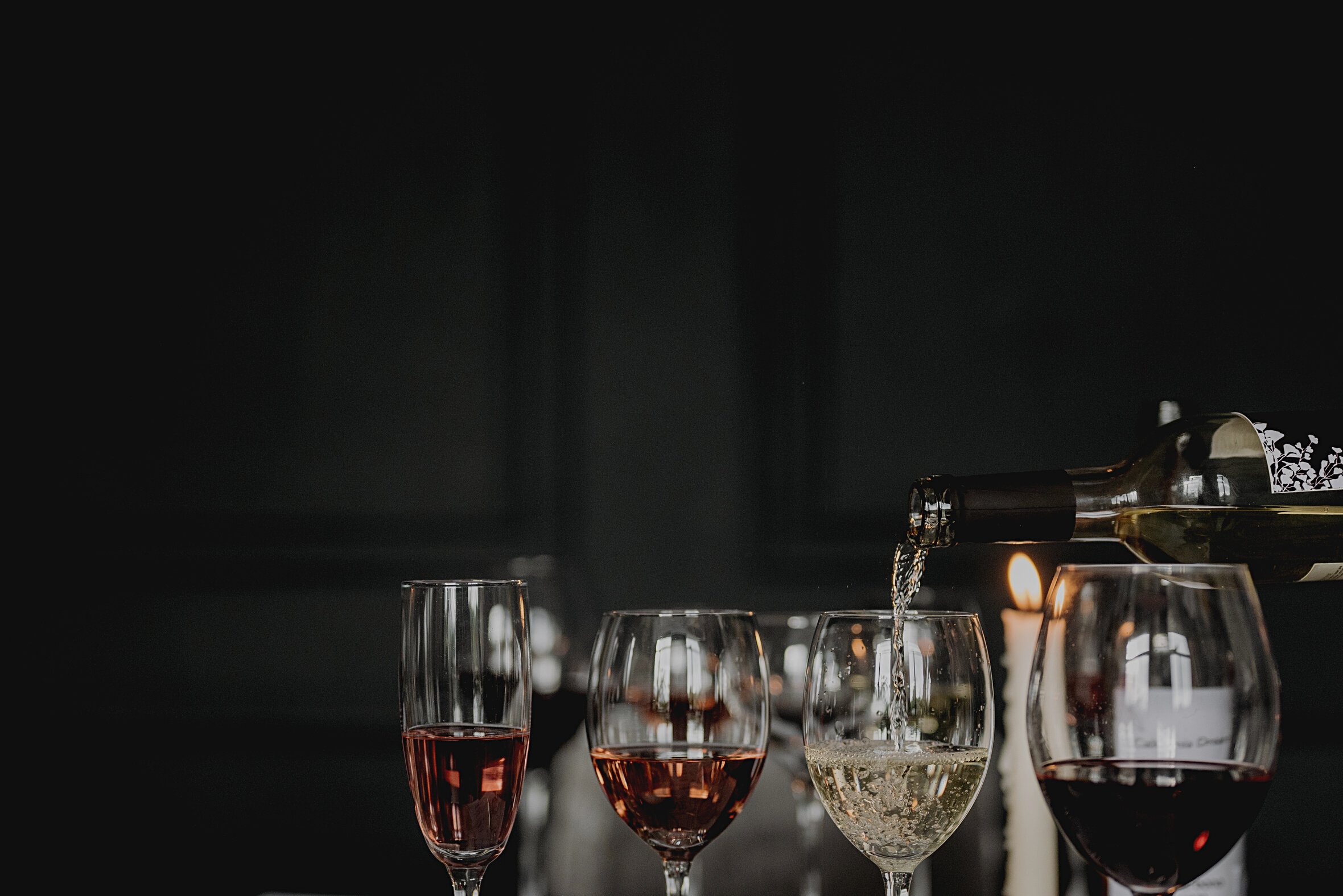 3 Clear Wine Glasses With Red Wine